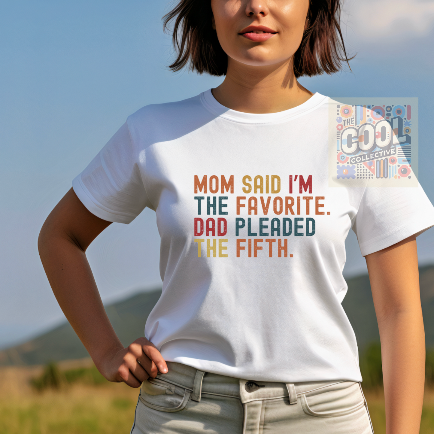 A retro-style unisex t-shirt with the text “Mom Said I’m The Favourite. Dad Pleaded The Fifth.” Perfect for siblings, family events, and funny gift ideas.
