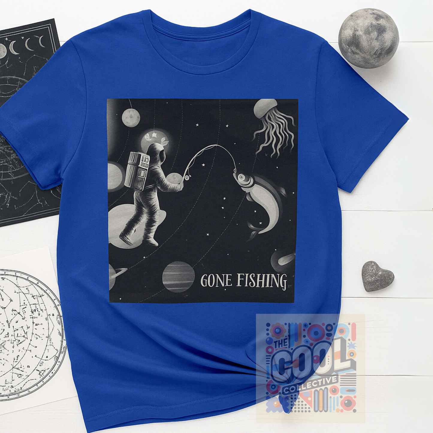 Retro-style astronaut fishing graphic on surreal galaxy backdrop – sci-fi space T-shirt with alt and vaporwave appeal