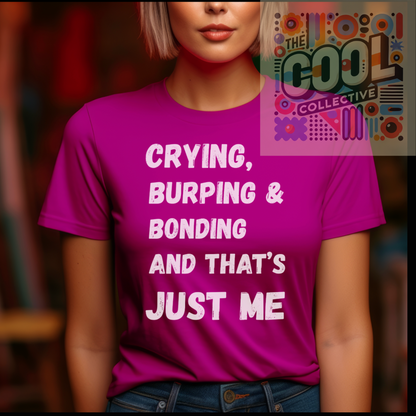 A unisex retro-style t-shirt with the phrase “Crying, Burping & Bonding – And That’s Just Me.” Ideal for new parents, caregivers, and baby shower gift buyers.